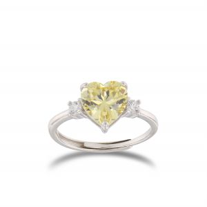 Ring with yellow heart shaped stone and white cubic zirconia