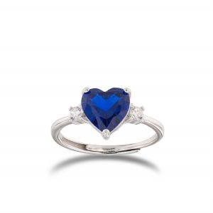 Ring with blue heart shaped stone and cubic zirconia