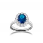 Royal ring with blue oval stone and cubic zirconia 