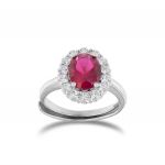 Royal ring with oval red stone and cubic zirconia