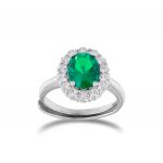 Royal ring with oval green stone and cubic zirconia 