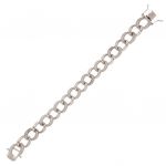Curb chain bracelet with glossy ovals alternating by cubic zirconia