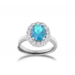 Royal ring with oval light blue stone and cubic zirconia